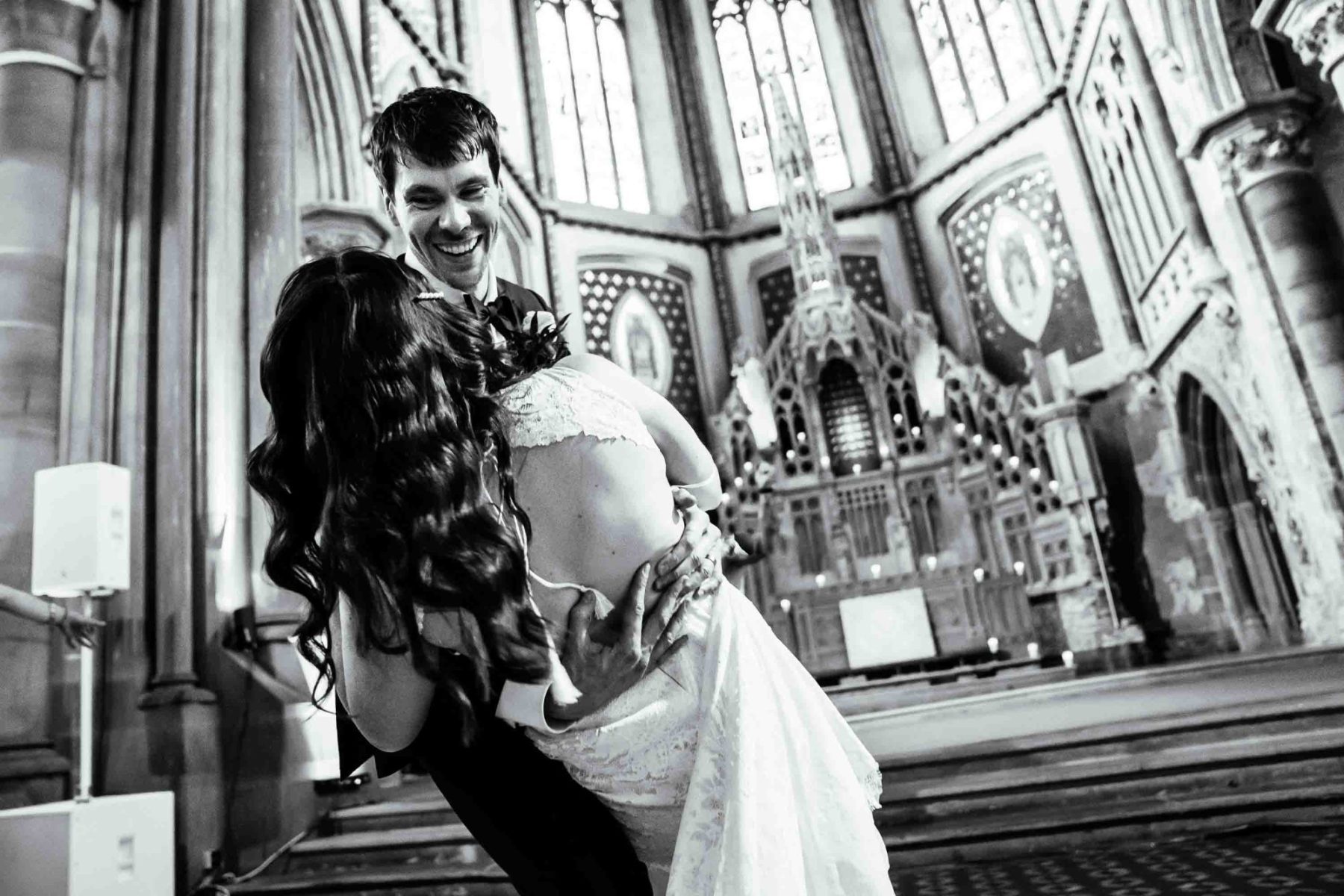 Bride and groom dancing at Manchester Monastery