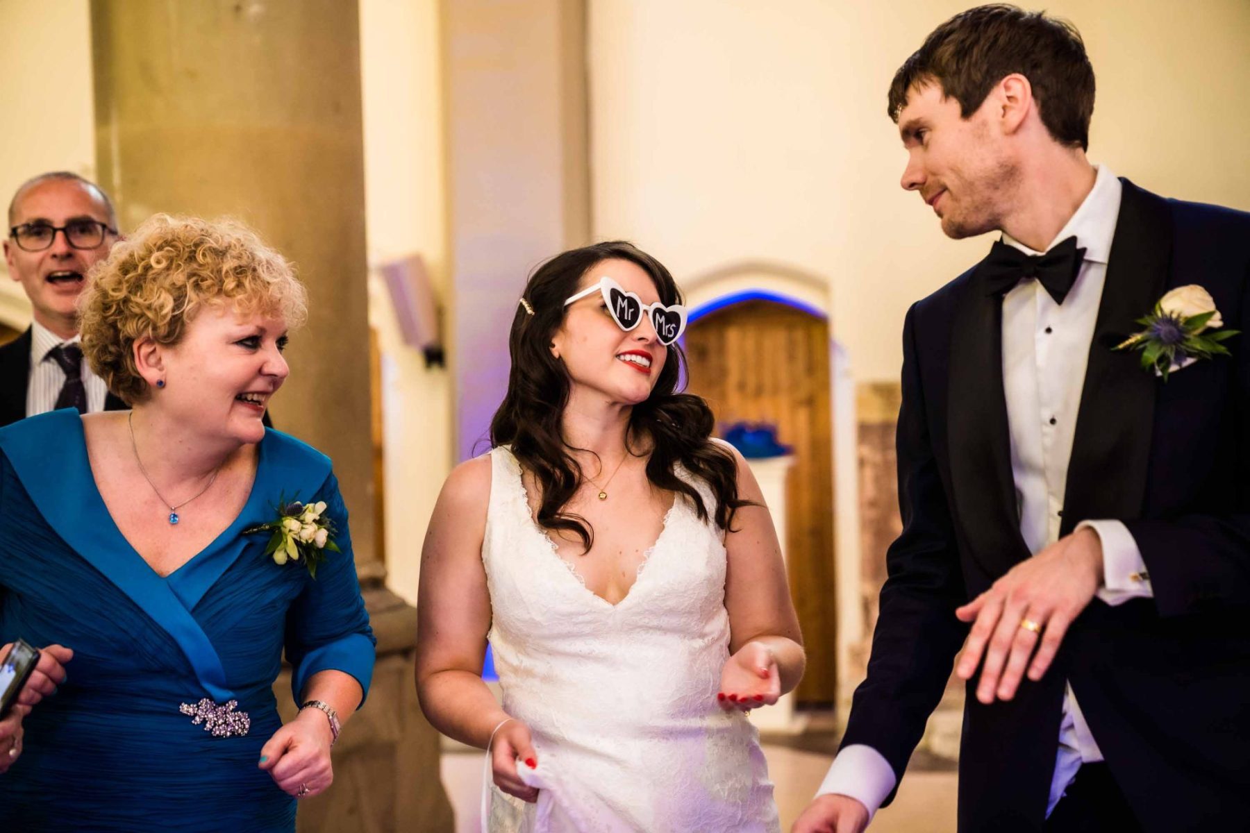 Bride and groom dancing with brides mother at Gorton Monastery Wedding