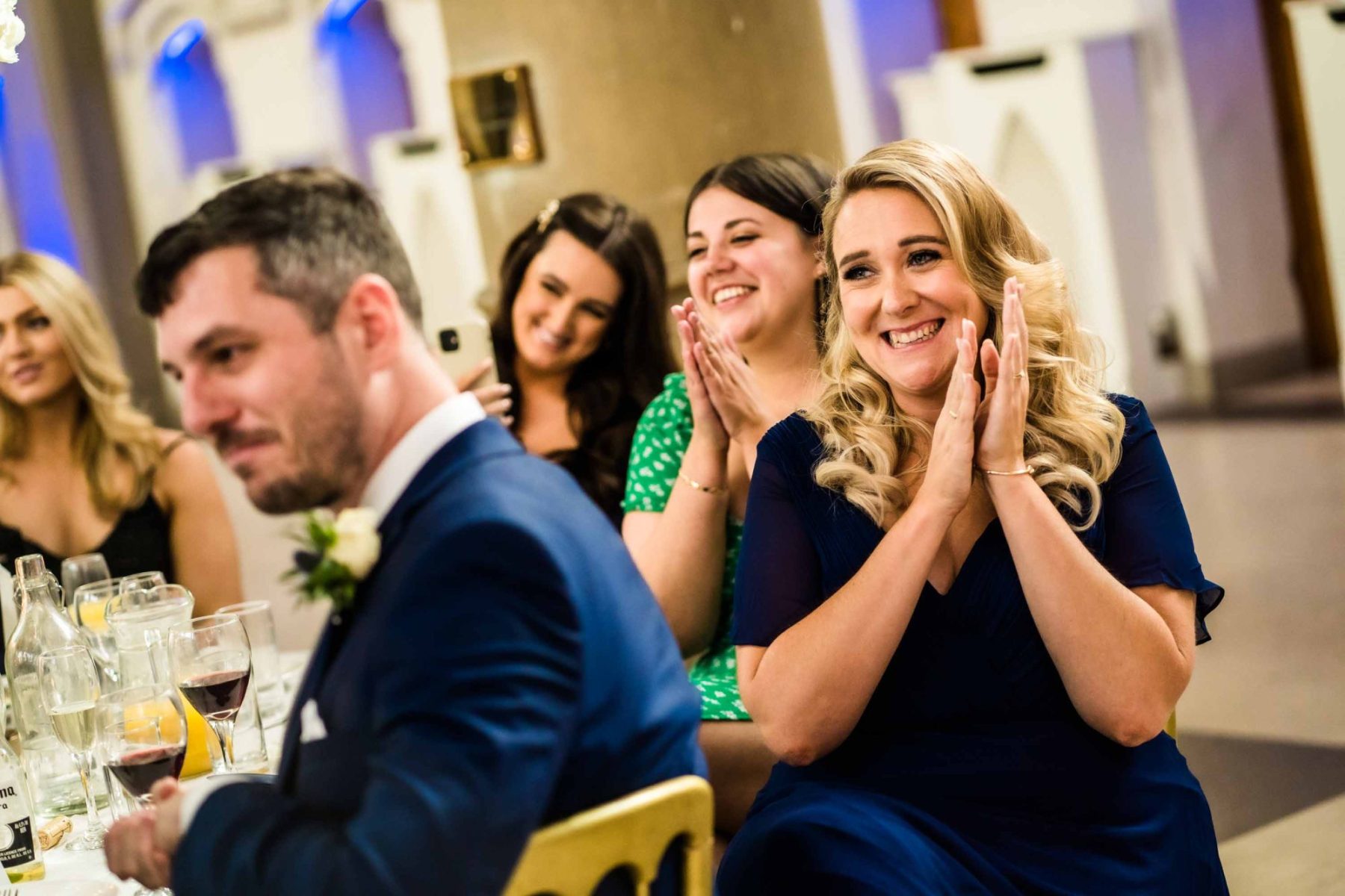 Guests clapping during speeches at Manchester Monastery Wedding